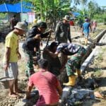 Gotong Royong Tanpa Lelah, Satgas TMMD Kodim 1505/Tidore Bangun Drainase Demi Desa Lebih Baik