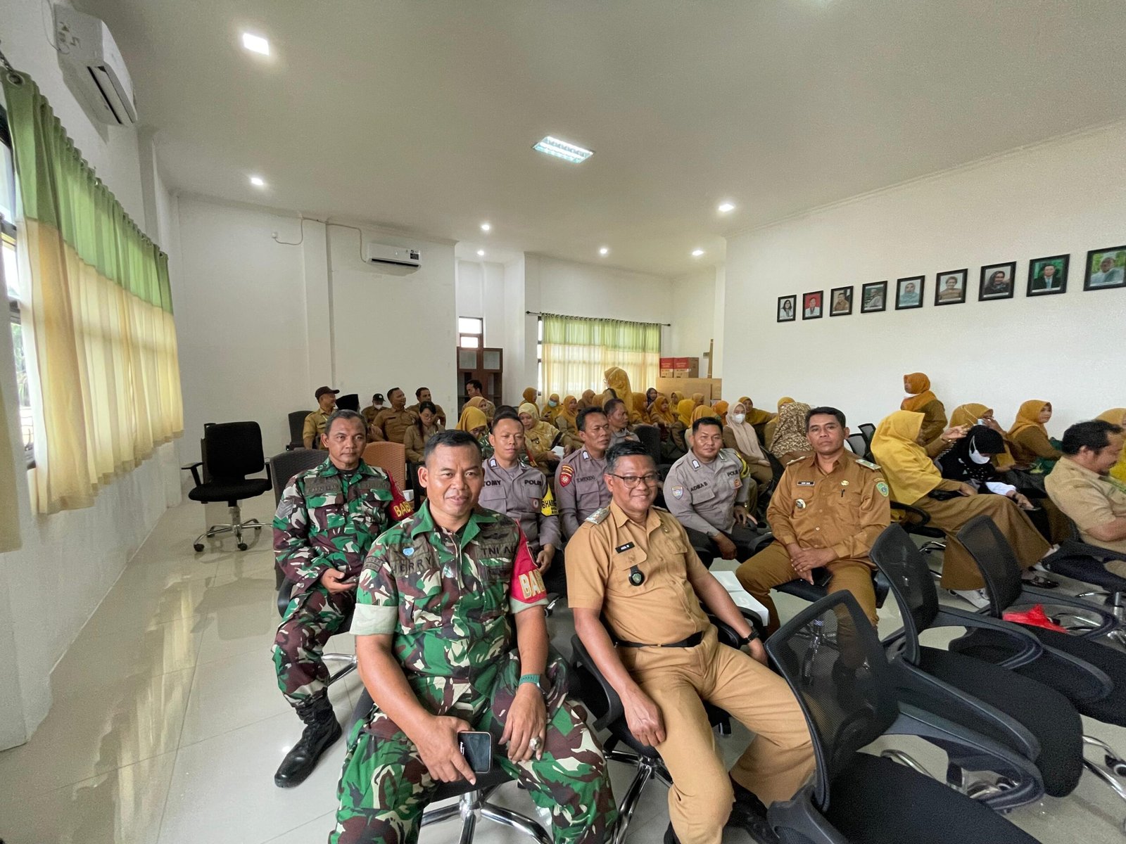 Babinsa Tanjung Tengah Hadiri Capaian Program Pelayanan Kesehatan 12 Indikator Standar Pelayanan Puskesmas Petung