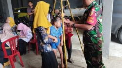 Wujud Babinsa Tawangrejo Dampingi Kegiatan Posyandu, Demi Tingkatkan Layanan Kesehatan Masyarakat