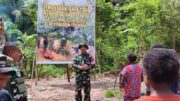Manfaatkan Lahan Tidur, Satgas TMMD Ke-128 Kodim 1710/Mimika Tanam Jagung Bersama Warga
