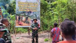 Manfaatkan Lahan Tidur, Satgas TMMD Ke-128 Kodim 1710/Mimika Tanam Jagung Bersama Warga