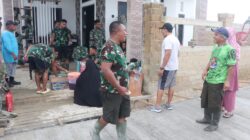 Kebersamaan Personel Satgas TMMD Ke-128 Kodim 0908/Bontang dan Warga Terjalin Hangat di Tengah Pengecoran Jalan