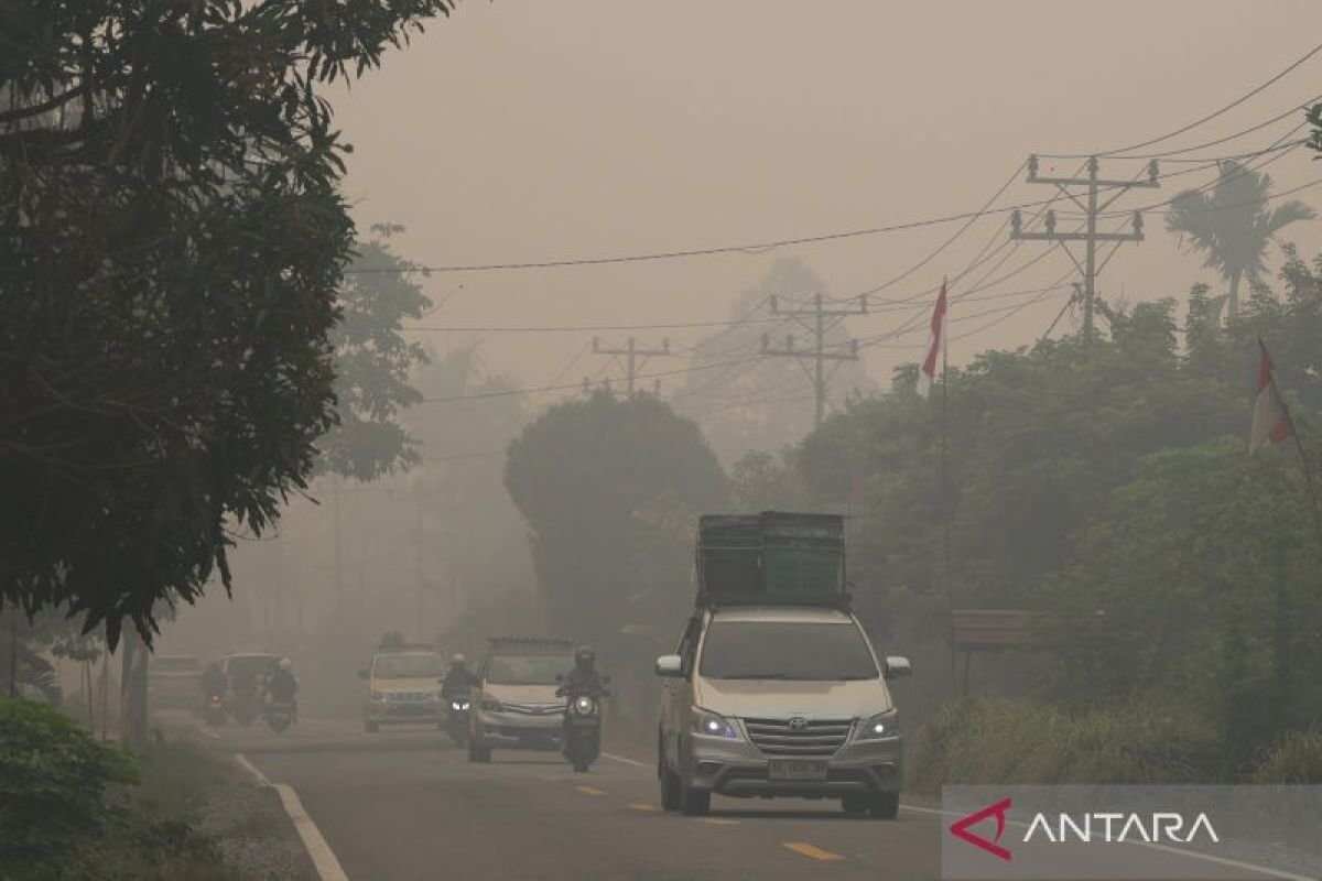 Kabut Asap Melanda Brunei Akibat Titik Panas di Kalimantan Kabut Asap Melanda Brunei Akibat Titik Panas di Kalimantan